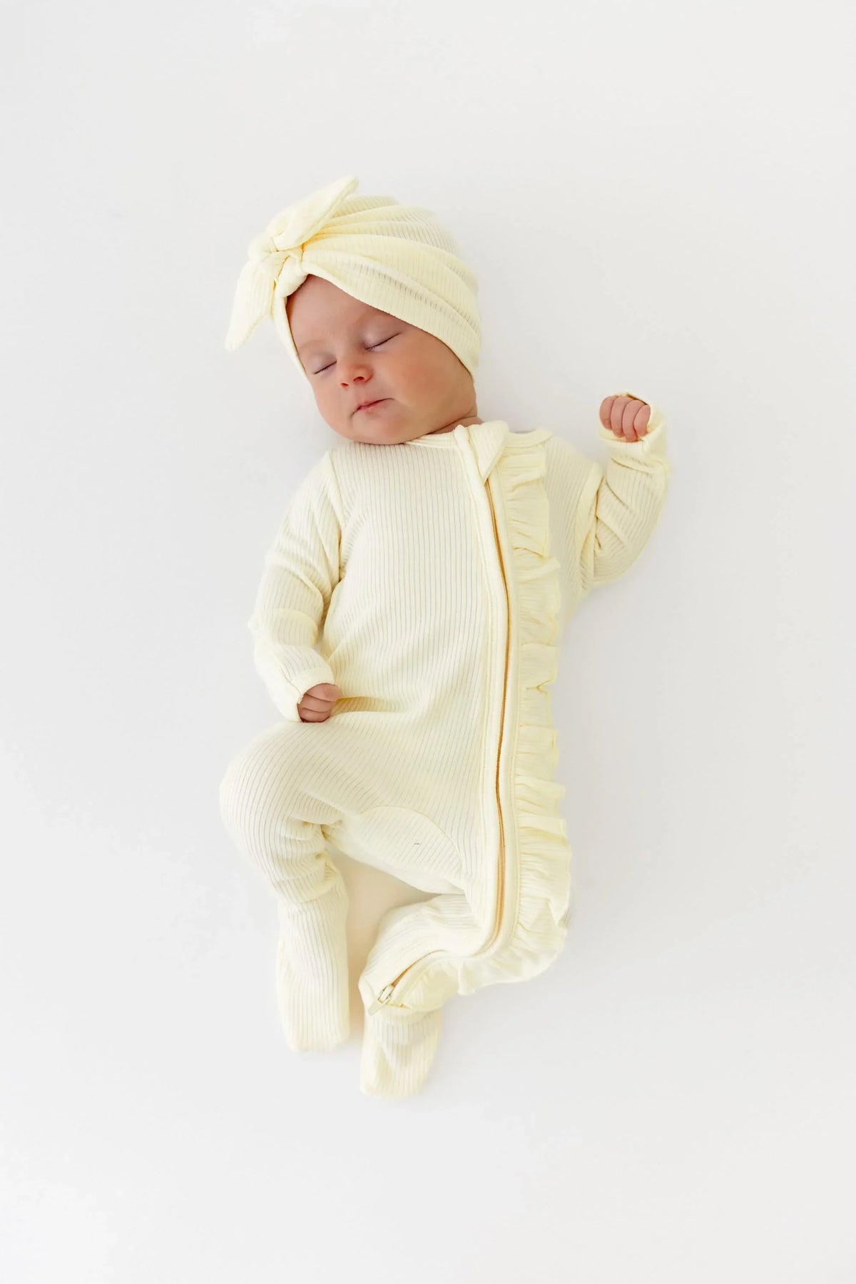 Ribbed Ruffle Zipper Footie in Chamomile